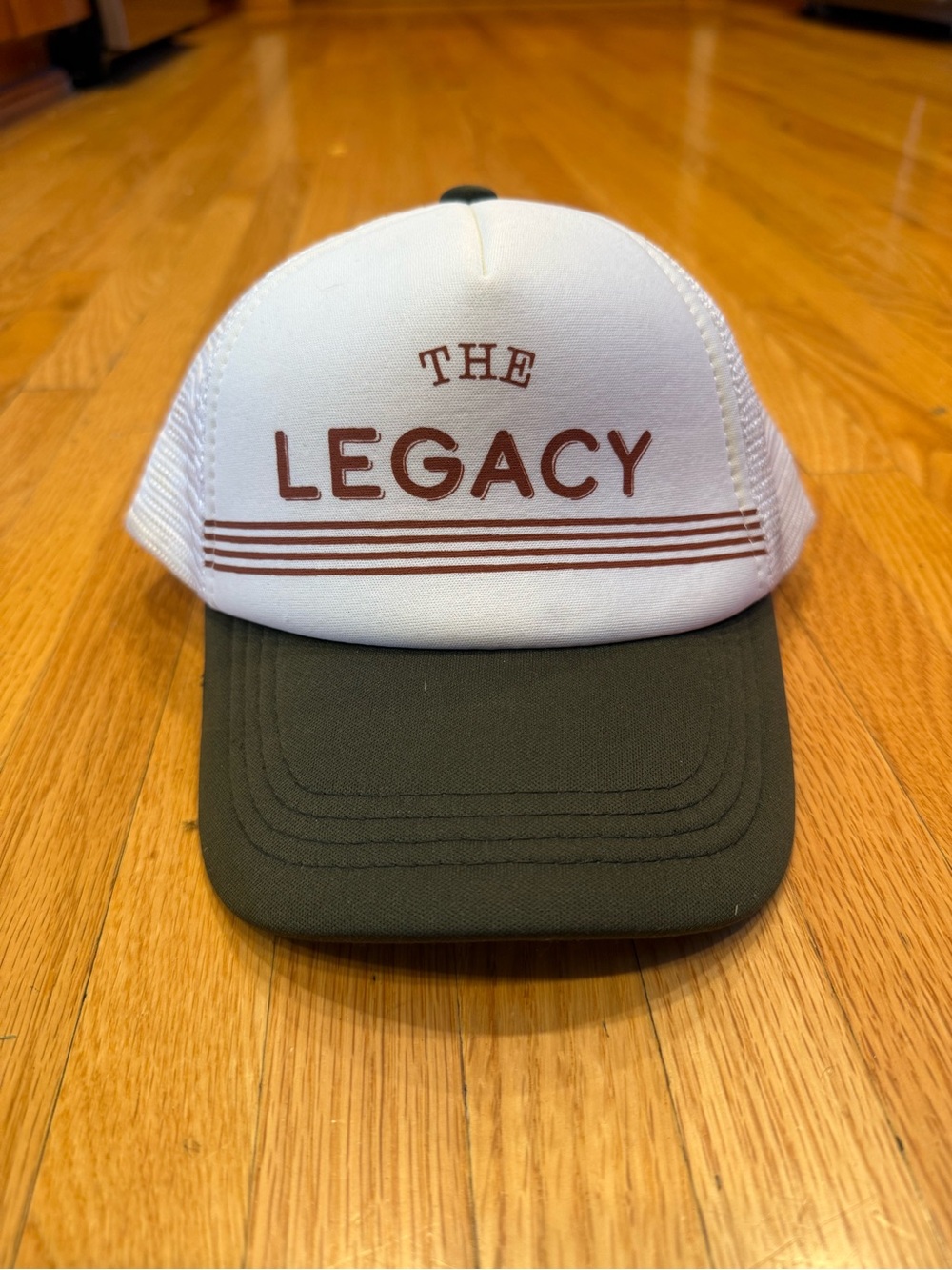 Legacy White and Olive Trucker Cap with 'THE LEGACY' Print